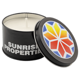 A Tropical Sunrise 5.3 oz. Candle in a Black Metal Tin