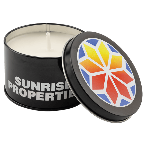 A Tropical Sunrise 5.3 oz. Candle in a Black Metal Tin