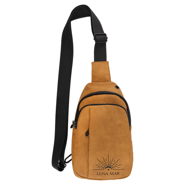 Light Brown Explorer Crossbody Bag — vegan leather with three zippered pockets and an adjustable crossbody strap, shown from the front.