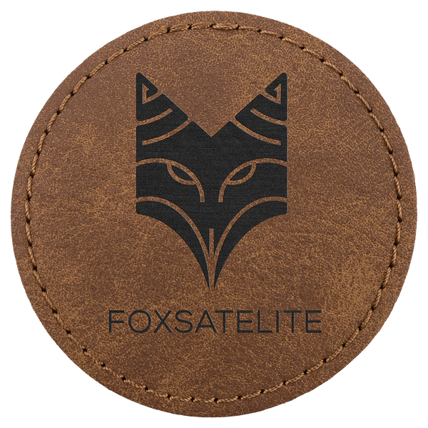 A Dark Brown 2 1/2" Premier Laserable Leatherette Round Patch Adhesive - Creekside Collection