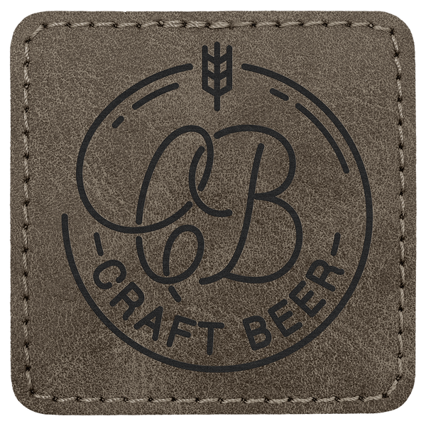 A Dark Gray 2 1/2" x 2 1/2" Premier Laserable Leatherette Square Patch Adhesive - Creekside Collection