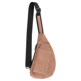 Tan teardrop sling bag with a black strap, zipper, and front slip pocket against a plain white background.
