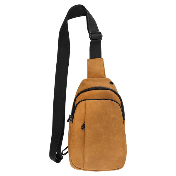 Tan crossbody sling bag with a black strap, front zipper pockets, and a small grommet hole on a white background.